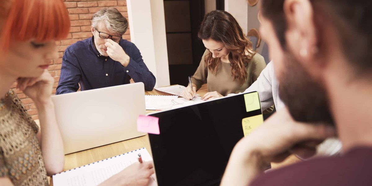 Tired man on the business meeting